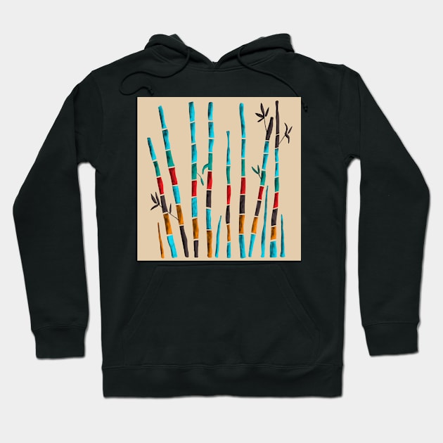 Colorful bamboo leaves on sand background Hoodie by colorofmagic